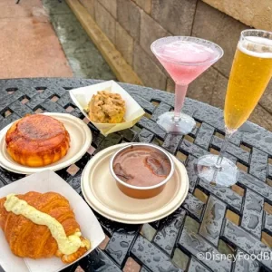 2025-wdw-epcot-flower-and-garden-festival-flag-fleur-de-lys-food-booth-full-spread-3-700x525.webp